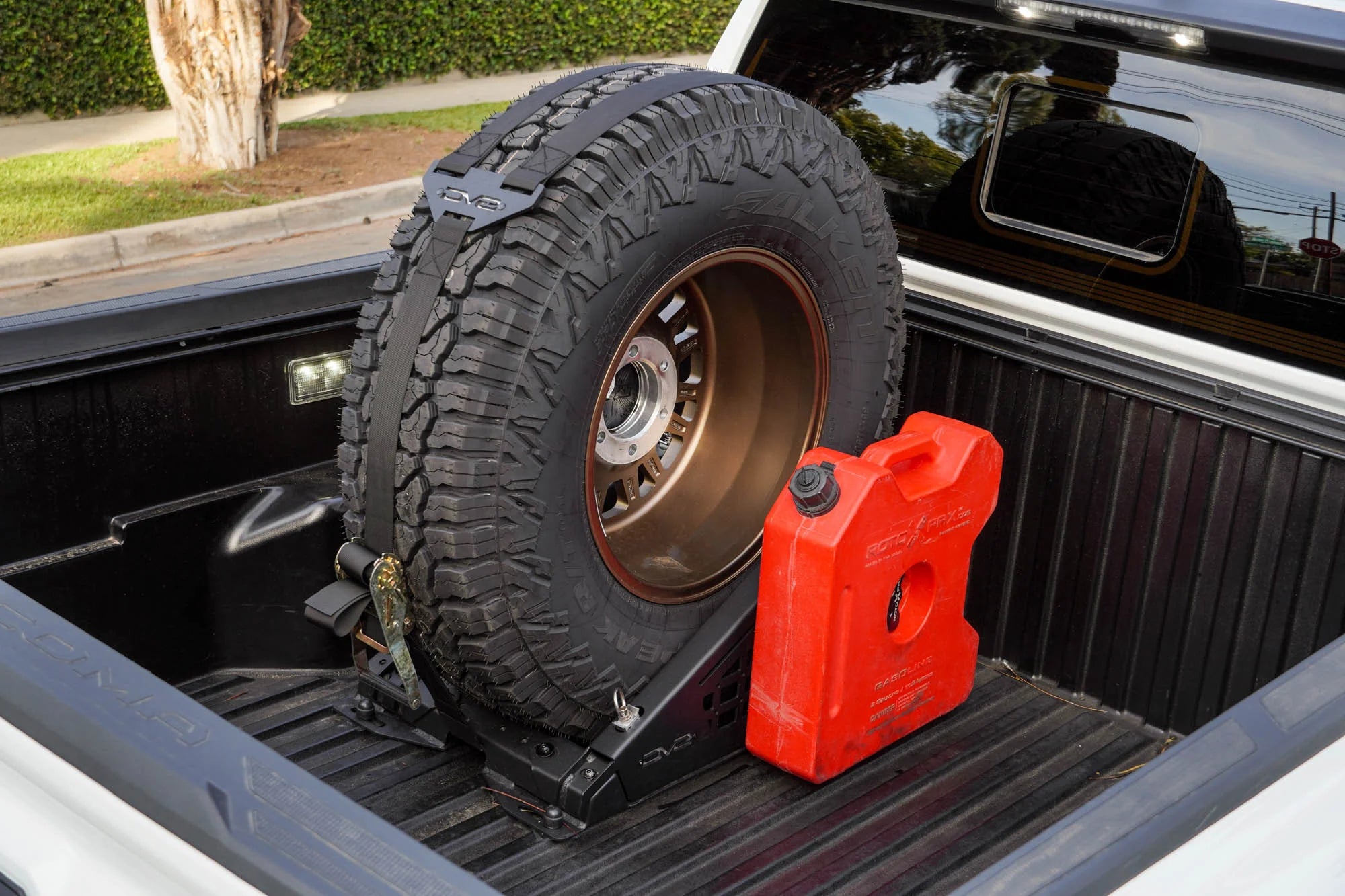Load video: Truck Bed Universal Tire Carrier &amp; Accessory Mount