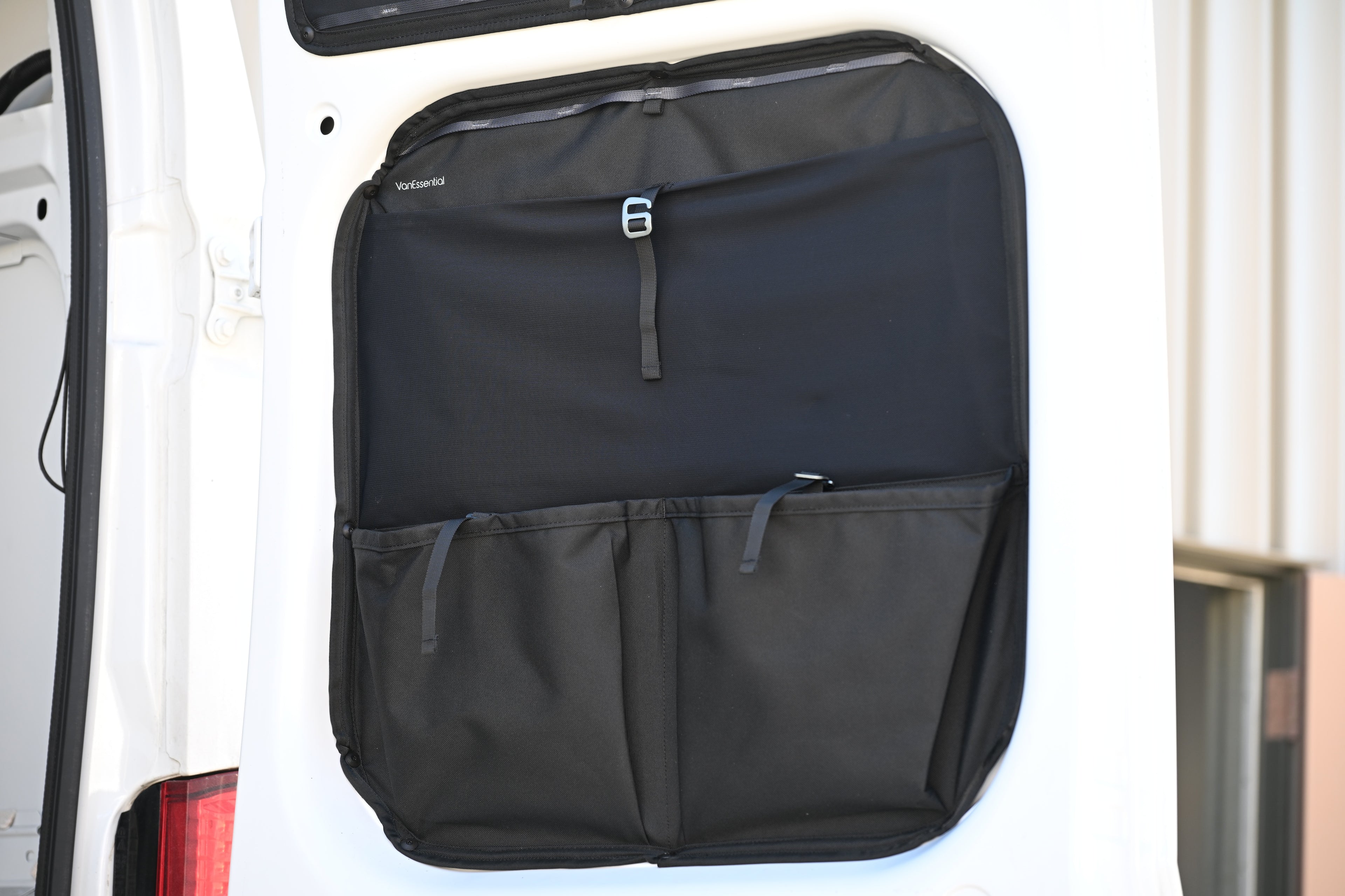 Load video: Promaster Mid-Door Storage Panels