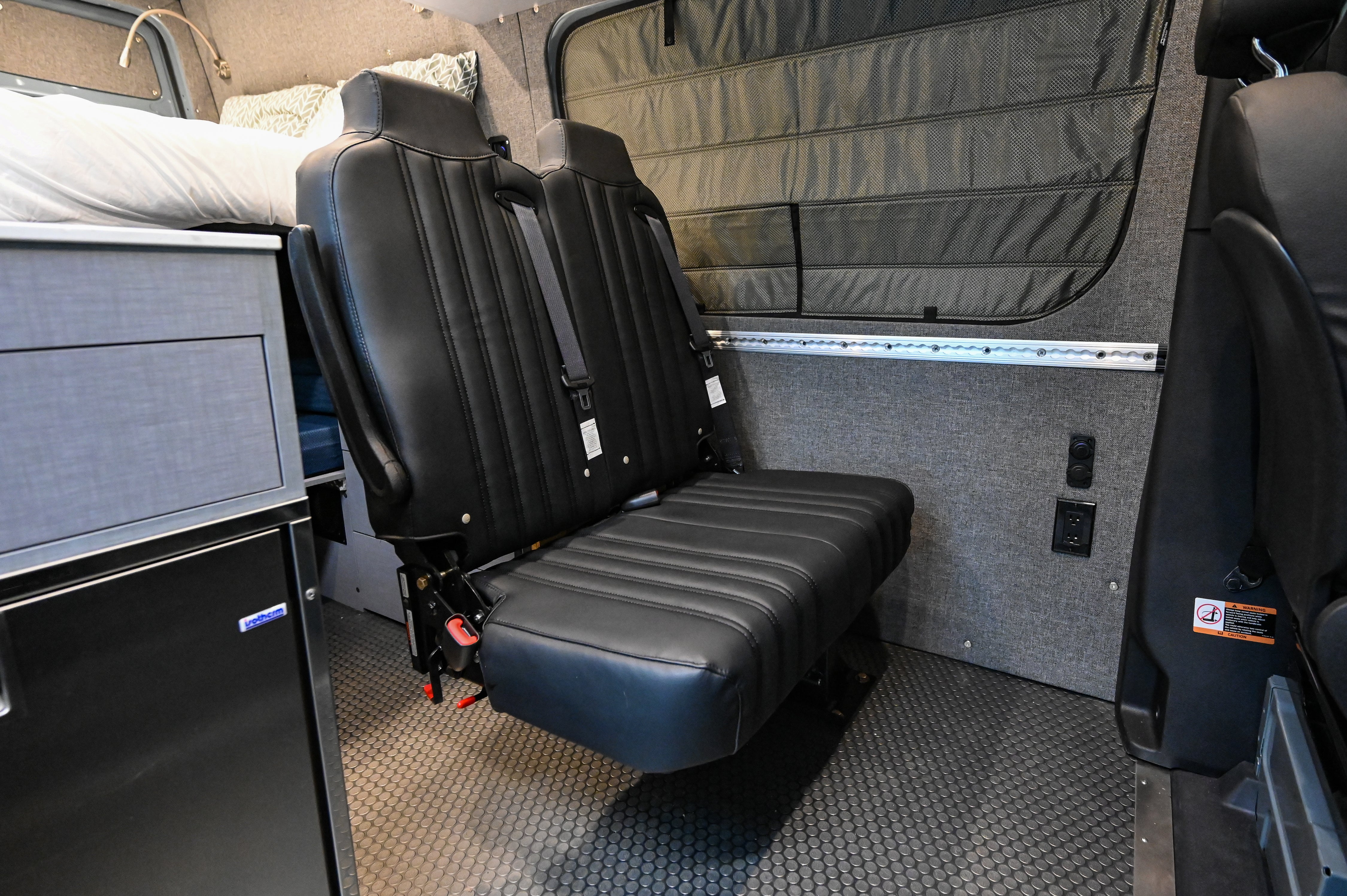 Hide N' Go Seat – Alpine Van Works, LLC - Main Image